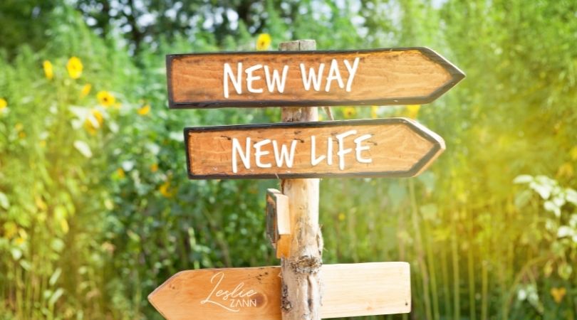 Wooden arrow signs pointing to the right New Way New Life
